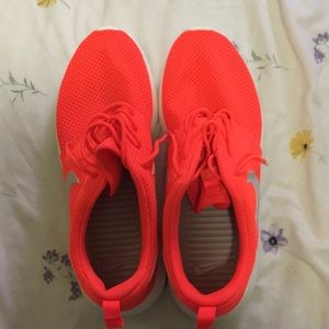 Brand new orange roshe